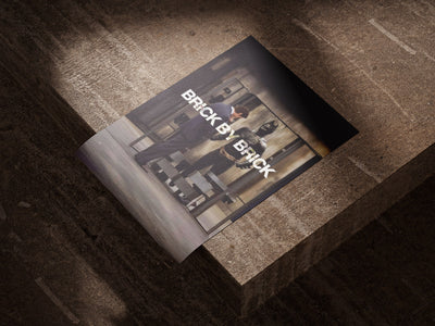 Brick by Brick poster styled room photo 2
